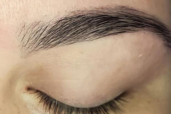 close up of an eyebrow after a brow wax at hideaway spa in windsor ontario